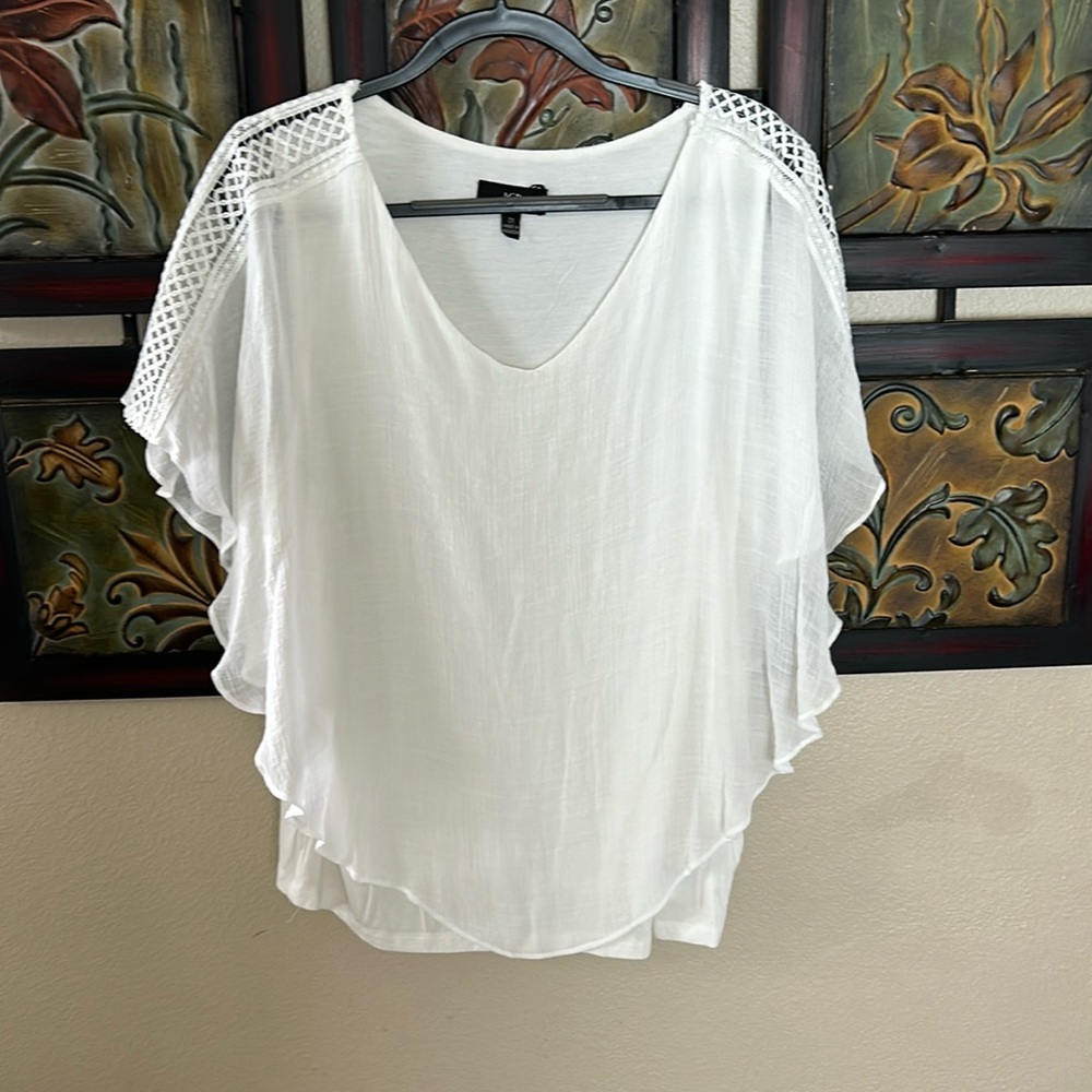 White flowy top